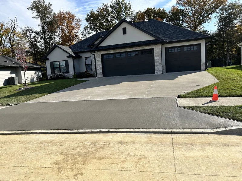 New concrete driveway and approach installation in Columbia MO by Creasy Slabs & Block