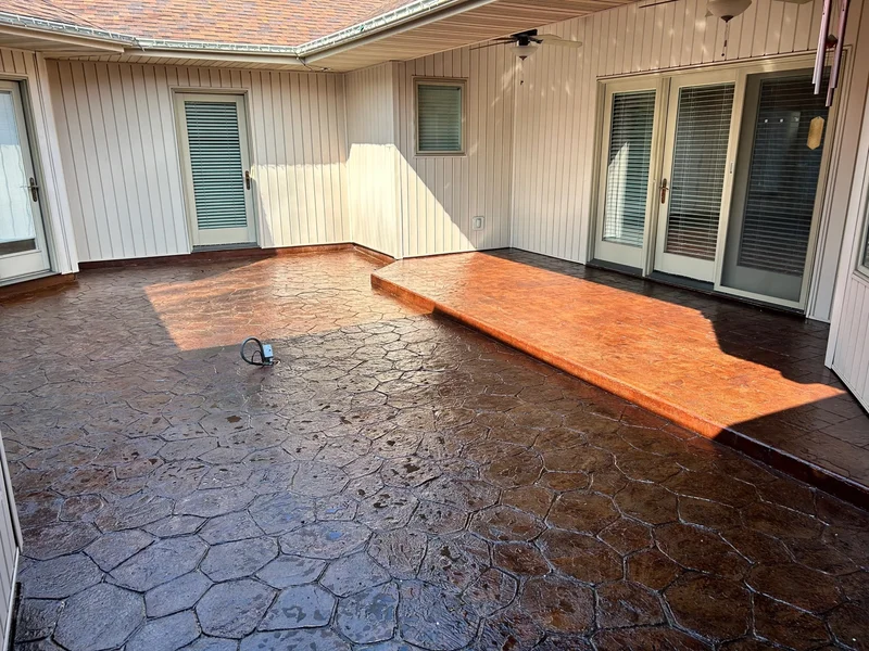 Stamped decorative concrete patio with custom texture in Columbia, MO